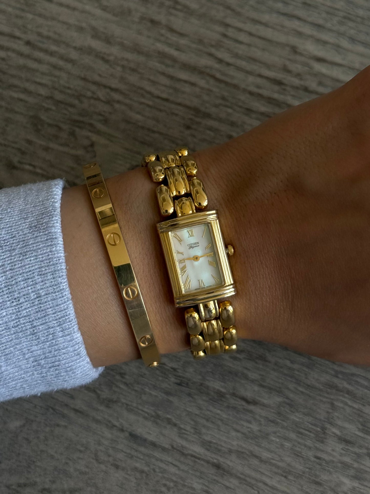 Classic Gold Toned Citizen Elegance Watch with MOP Dial