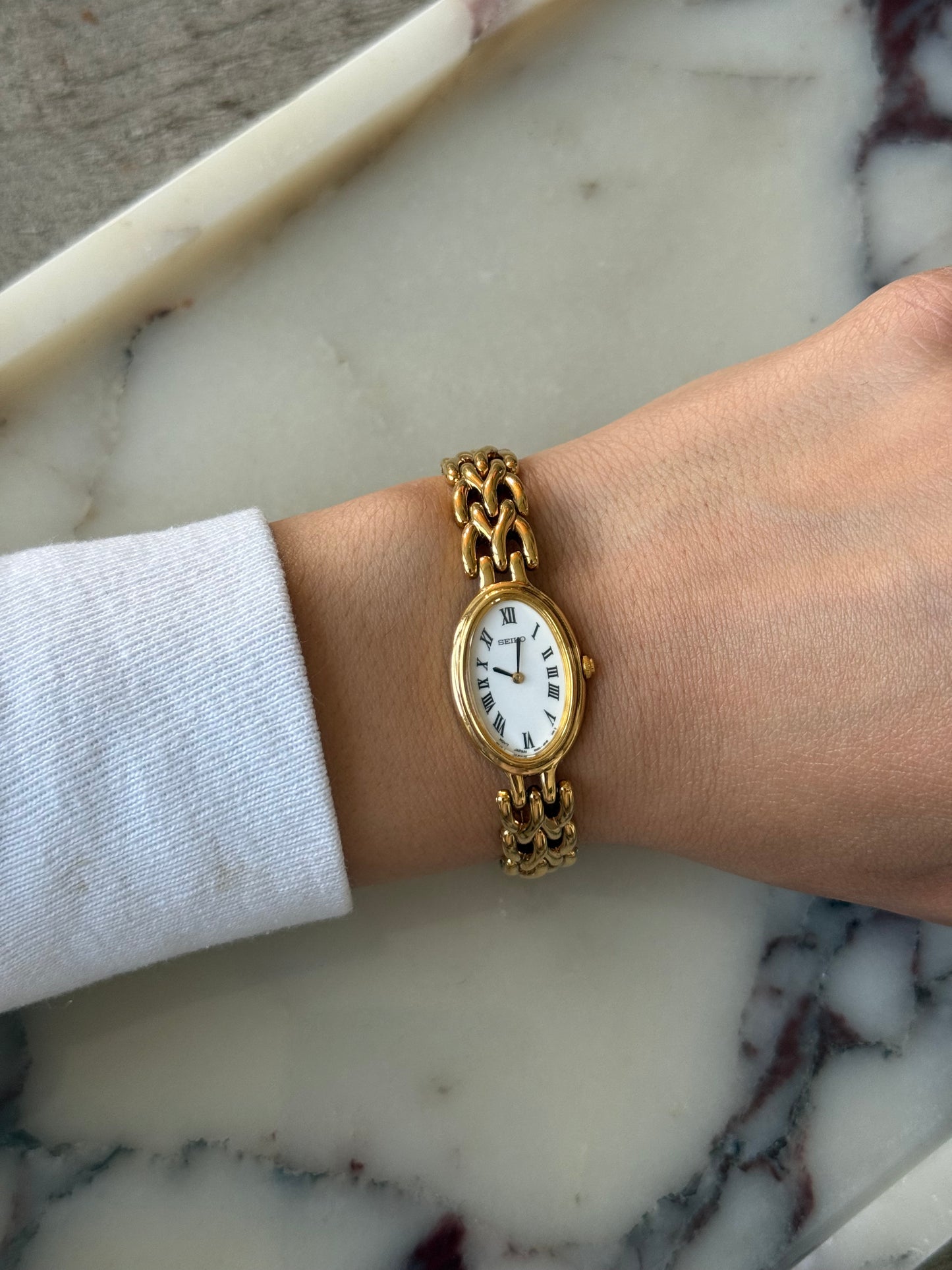 Gold Toned Roman Numeral Seiko Watch