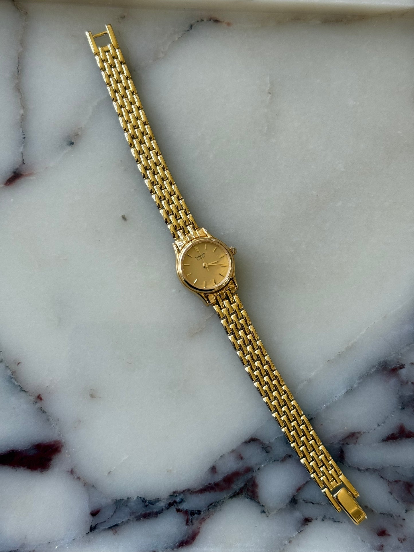 Gold Toned Pulsar Watch