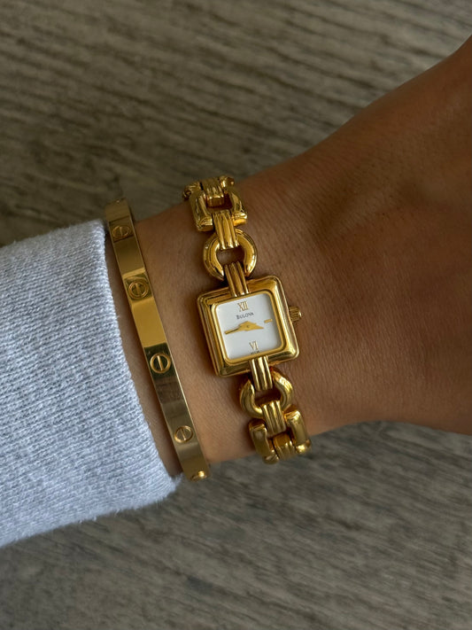 Classic Gold Toned Bulova Watch with White Square Face