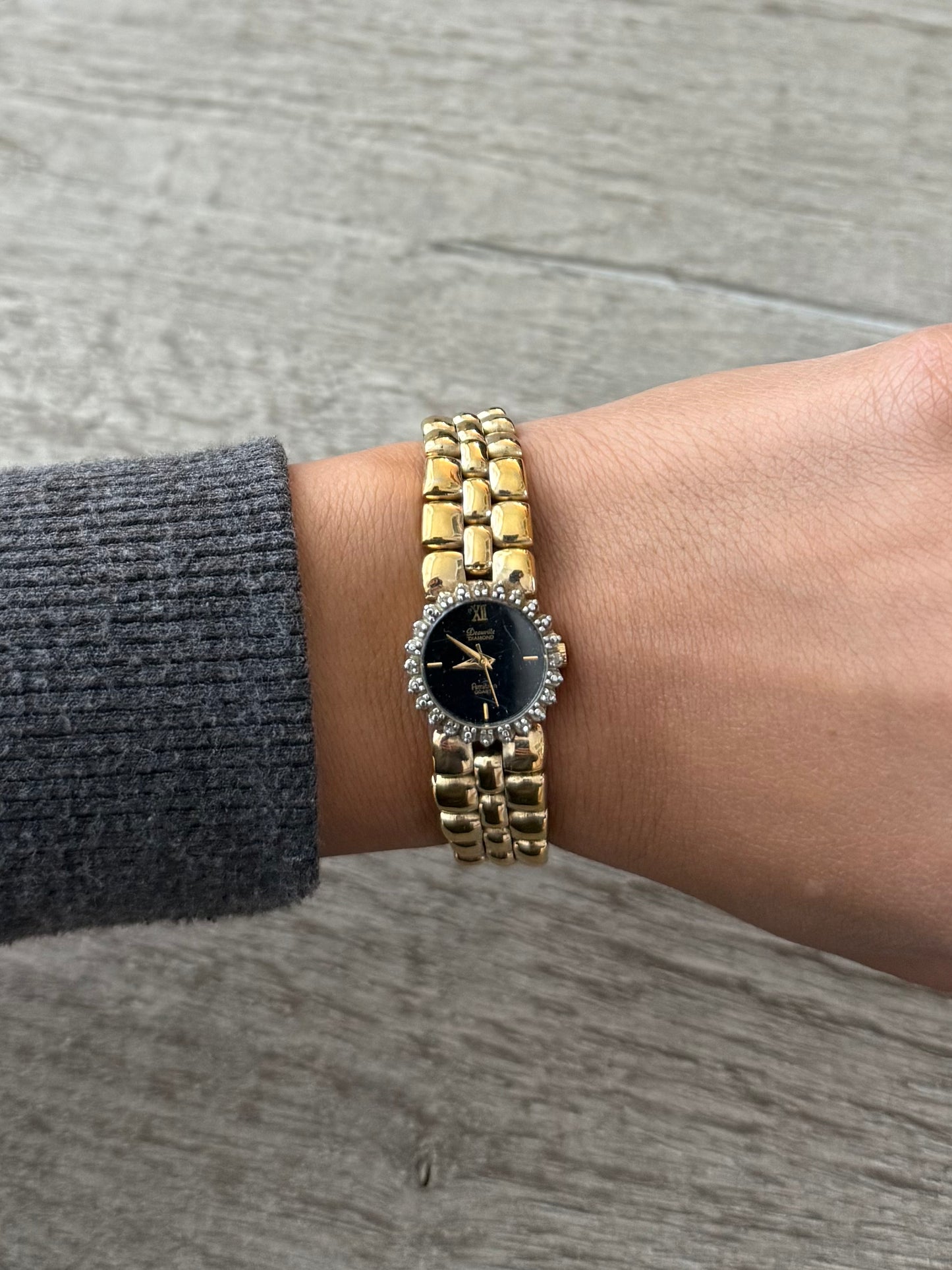 Gold Toned Armitron Dark Dial Watch with Crystal Bezel