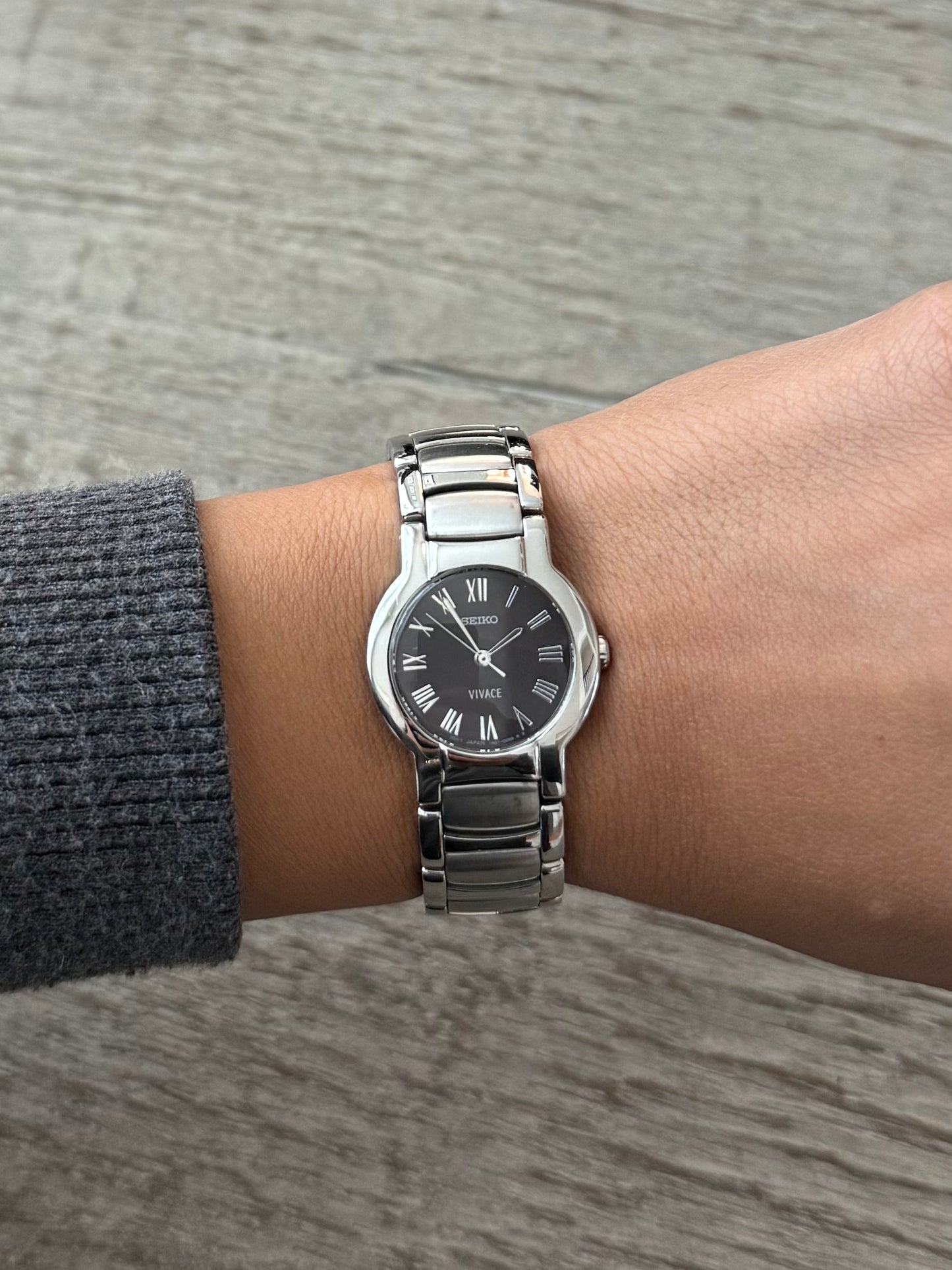 Classic Seiko Silver Watch with Dark Dial