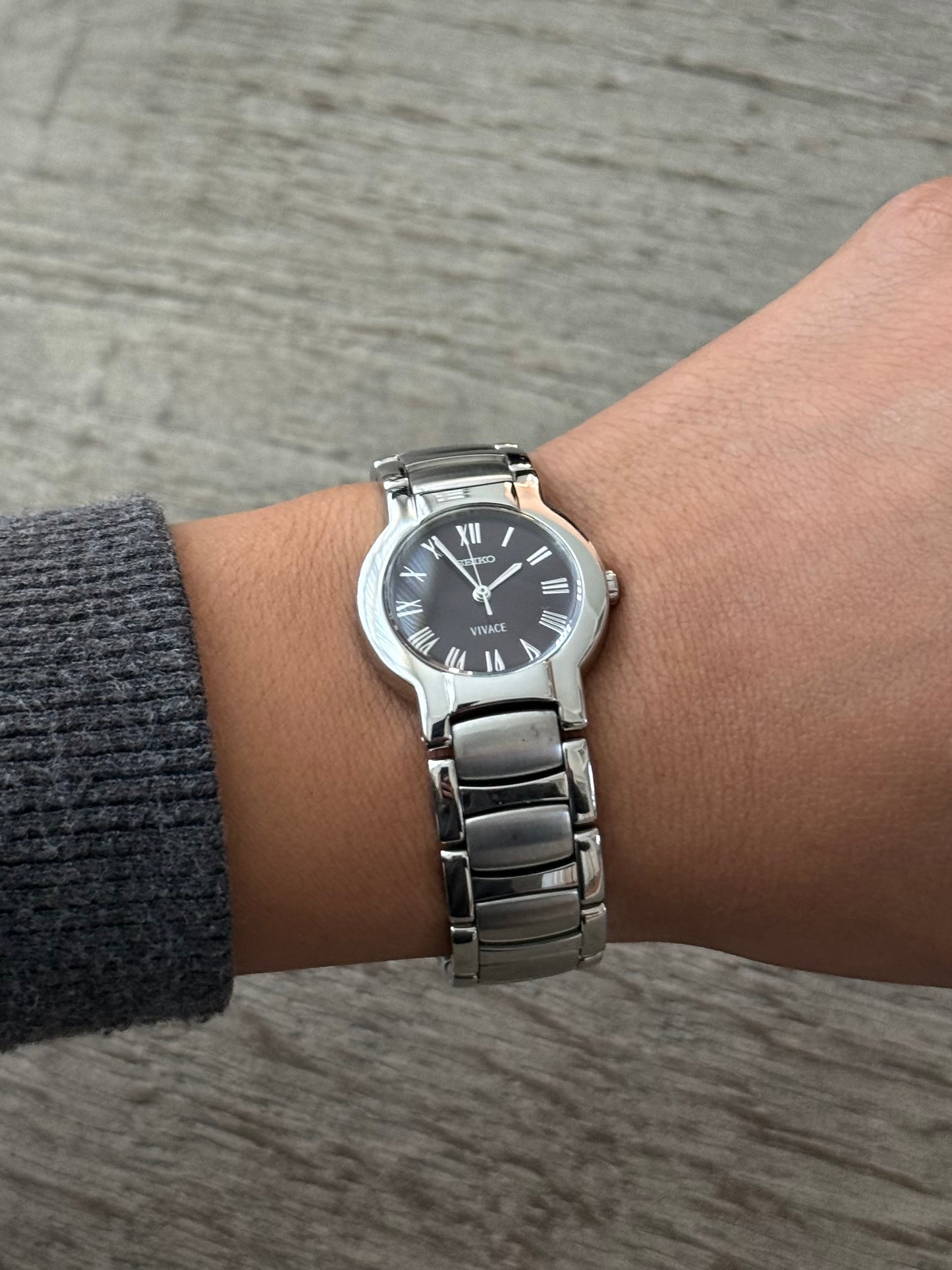 Classic Seiko Silver Watch with Dark Dial